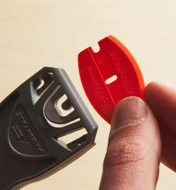 Curved Orange Plastic Razor Blades