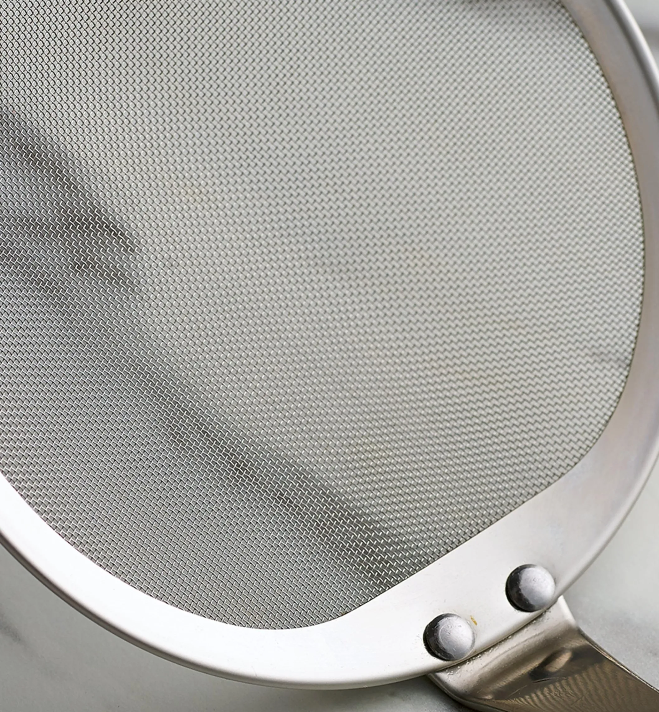 Fine-Mesh Skimming Ladle